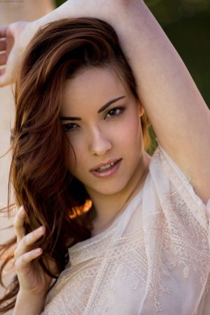 Elizabeth Marxs squeezes yummy boobs on the lawn photo 8
