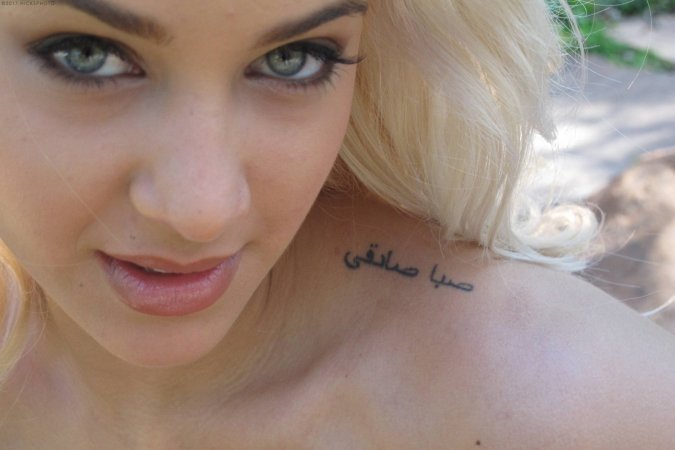 Young blonde Uma Jolie is making erotic photo session photo 1