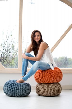 Michaela Isizzu shows pussy in front of a window photo 2